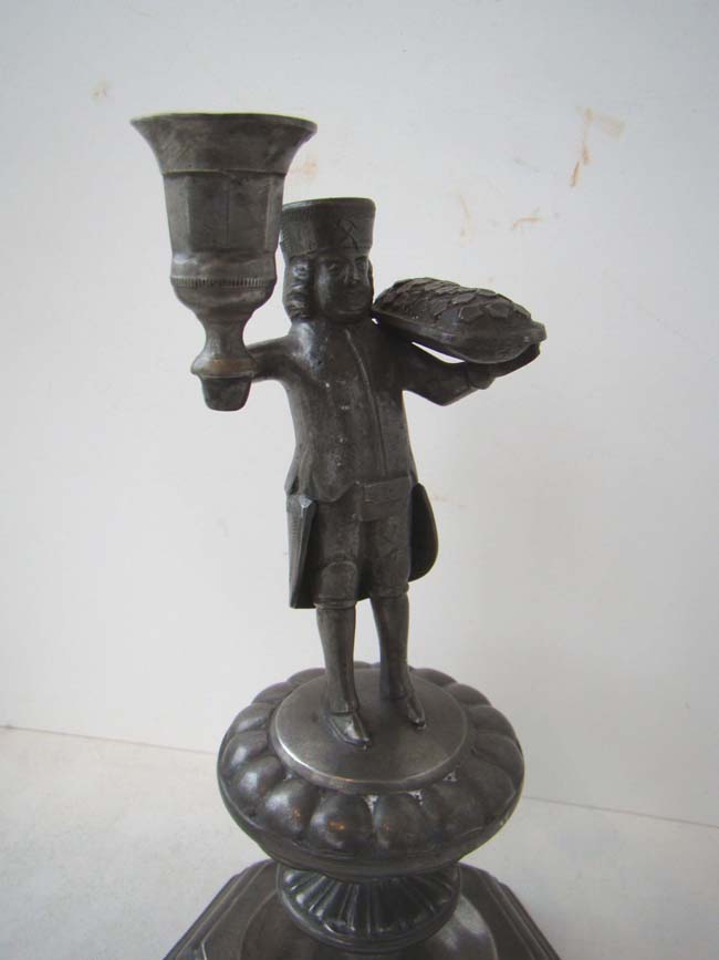 A nice pair of early 18th century Dutch pewter candlesticks depicting a Butcher and a Baker — image 4